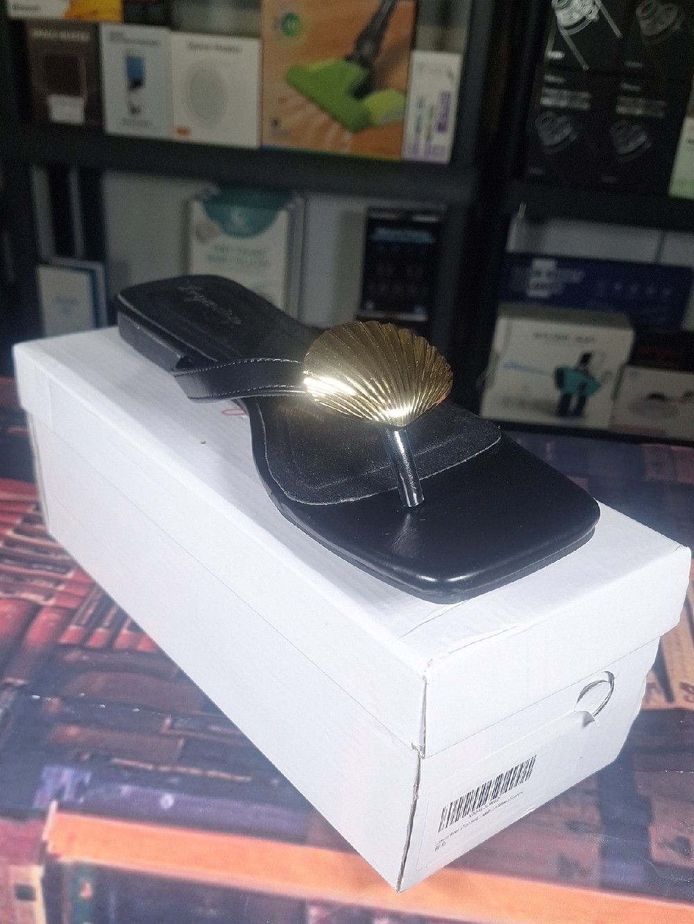 Black Sandal with Gold Shell Accent